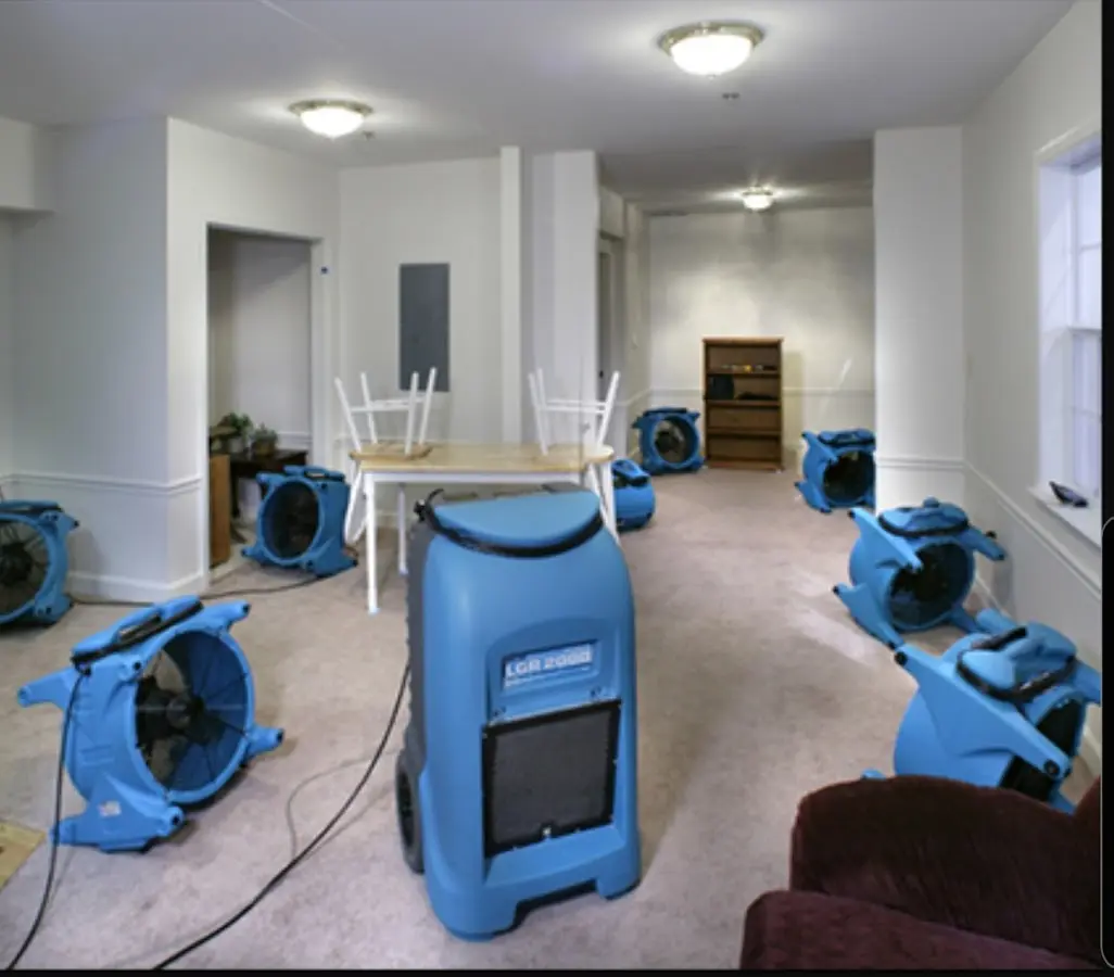 Air movers and dehumidifier setup for Water Damage Restoration in Aventura