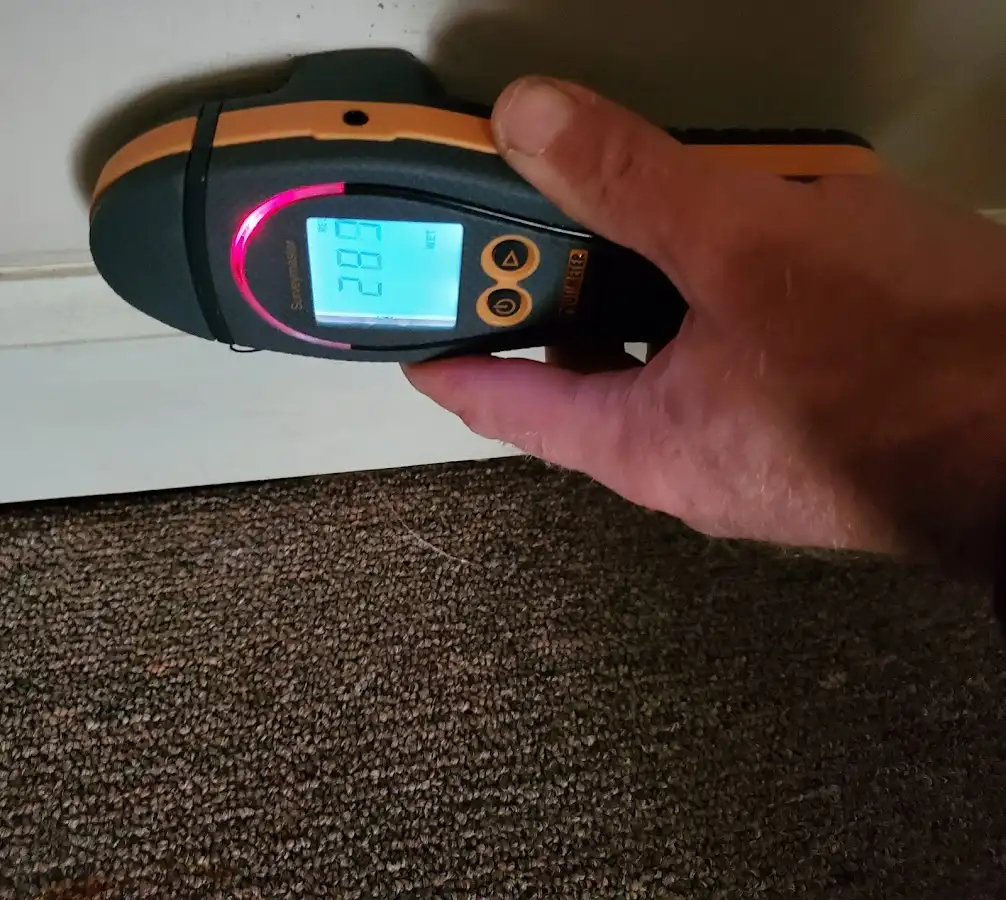Moisture detection at baseboard during Sewage Cleanup & Sanitation in Aventura